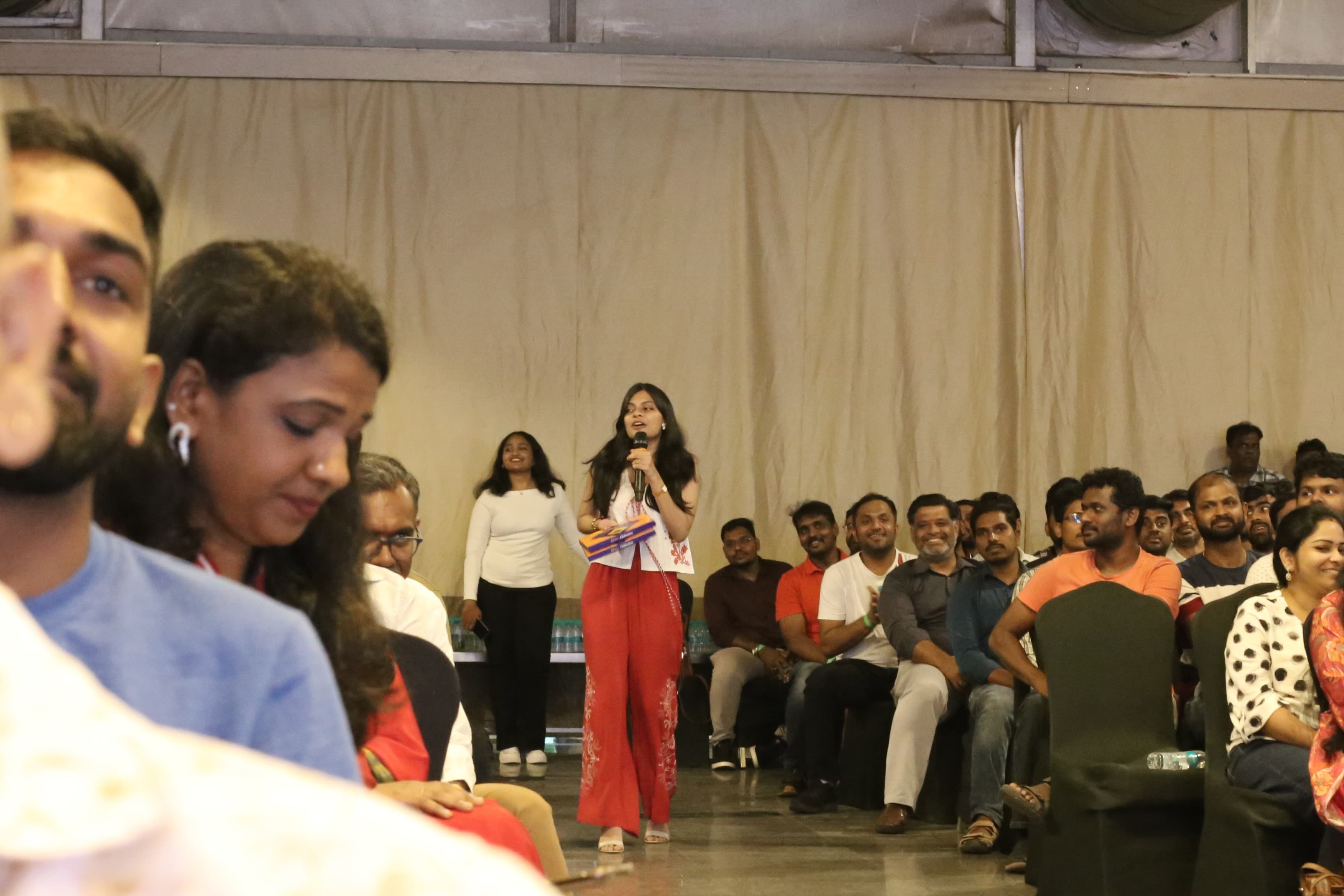 Sneha Michelle hosting an enterprise event